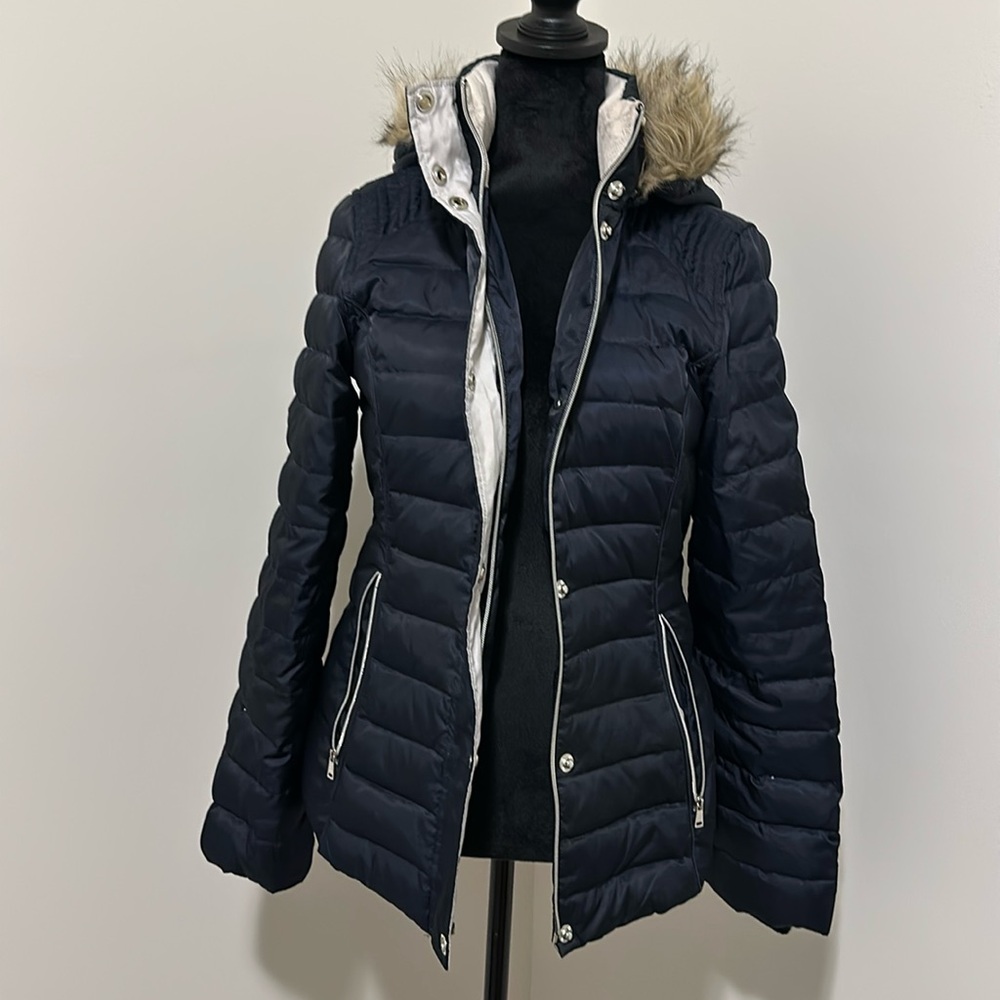 Puffer jacket with fur lined hood